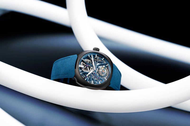 The watch among white curving tubes